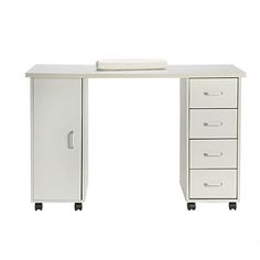 a white desk with four drawers and a towel on the top one drawer is open