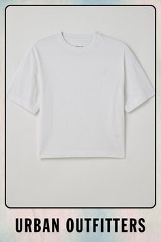 Boxy fit t-shirt by Standard Cloth with a cropped silhouette. Short sleeve style with a crew neck. Topped with a tonal logo accent. Urban Outfitters exclusive. Features Cropped & boxy tee from Standard Cloth Premium cotton jersey fabrication Short sleeves Ribbed crew neck UO exclusive Content + Care 100% Cotton Machine wash Imported Size + Fit Model is 5'6.5" and wearing size Medium Measurements taken from size Medium Chest: 23.5" Length: 23.5" | Standard Cloth Foundation Tee in White, Men's at Boxy Sporty Cropped T-shirt With Crew Neck, White Relaxed Fit Cropped Shirt With Crew Neck, Sporty Boxy Crew Neck T-shirt, Basic Boxy Cropped T-shirt For Streetwear, Modern Boxy Crew Neck T-shirt, Basic Relaxed Fit Cropped Shirt With Crew Neck, Relaxed Fit Athleisure Cropped Shirt With Crew Neck, Sporty Cropped Shirt With Relaxed Fit And Crew Neck, Basic Cropped Crew Neck T-shirt For Streetwear