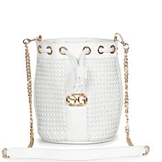 Versatile and visually stunning, the Hasley white leather bucket is an ultra luxe bag featuring an incredible two color hand woven leather upper , a padded leather handle and a detachable gold toned metal chain sling strap. The handy drawstring opening guarantees easy access. Made to be your new fashion favourite. Hang it on your shoulder to complement your blazer and pencil skirt ensemble. - White handwoven leather upper - Cotton lined with drawstring closure. - Padded leather handle with a det Luxury White Bags With Chain Strap, Trendy White Evening Bucket Bag, White Crossbody Bucket Bag For Evening, White Evening Bucket Bag Crossbody, White Evening Crossbody Bucket Bag, Chic White Shoulder Bucket Bag, Luxury White Bucket Shape Shoulder Bag, Elegant Woven Leather Bucket Bag, Elegant Woven Leather Crossbody Bucket Bag