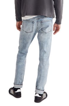 Fitted through the hip and thigh with a straight leg, these are classic, can't-go-wrong slim-fit jeans. Premium Authentic Flex selvedge denim combines a rigid look with all the comfort of stretch. 10 3/4" front rise 98% cotton, 2% polyurethane Machine wash, tumble dry Imported Rugged Fitted Straight Leg Jeans, Urban Selvedge Straight Leg Jeans, Rugged Fitted Denim Jeans, Rugged Medium Wash Bottoms With Standard Cut Leg, Rugged Denim Jeans With Standard Cut Leg, Rugged Straight Leg Bottoms For Everyday, Rugged Fitted Jeans With Five Pockets, Rugged Standard Cut Denim Jeans, Rugged Fitted Washed Jeans