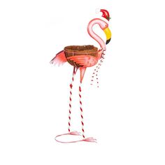 a pink flamingo standing on its hind legs holding a potted plant in it's beak