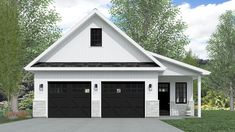 a white house with two black garage doors