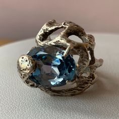 Great Vintage Ring, 925 Sterling Silver (Stamped And Tested) With Nice Blue Color Spinel Stone. This Ring Looks It Is Artisan Crafted, Unusual Design , The Stone Is Oval Shape, Approx. 11mm Long By 8mm Wide. The Ring Weights Hefty 10.25 Grams And A Sits Between Size 4.75 And 5 On Ring Mandrel (The Band Is 5mm Wide) . The Stone Is Moving In The Setting, Any Jeweler Can Tighten It Up, Otherwise The Stone Is In Great Condition Without Any Signs Of Wear. Very Nice, Unusual Looking Ring! Spinel Stone, Ring Mandrel, Blue Spinel, Spinel Ring, Unusual Design, Vintage Ring, Artisan Craft, Silver Blue, Womens Jewelry Rings