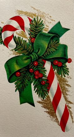 a christmas card with candy canes, holly and candies on it's side