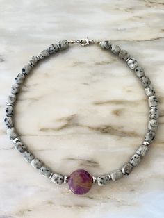 A necklace made of natural stone suitable for holidays and everyday wear, for office and concert, a gift for mom, sister, or a friend for their birthday, wedding day, Christmas, or Valentine's Day. A personalized meaningful gift based on the zodiac sign and moon phase. A large fluorite charm, 0.88 ounces in size, supports hematite beads and hematite inlays. Steel hardware, lobster clasp. The size of the dolomite stones is 8x12 mm. Lithotherapy. Hematite Beads, Black Necklace, A Necklace, Meaningful Gifts, Zodiac Sign, Gift For Mom, Precious Stones, Zodiac Signs, Lobster Clasp