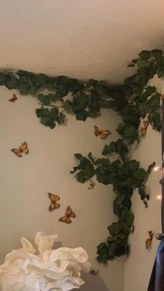 the butterflies are all over the wall in the bedroom, and on the walls there is a sheet of paper