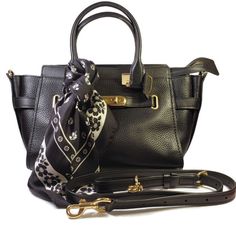 Coach Swagger 27 Black Pebble Satchel Handbag With Fabric Lining, Zip Top Closure. New With Tags, No Box Or Dust Bag. Multifunctional Inside Pockets With Snap And Zipper Closure Strap For Over The Shoulder. Crossbody Look 19 Inches And Handle Is 4 Inch Drop For A Classic Look. Gold Hardware Coach Logo On All The Hardware. Gold Feet On The Bottom Of The Handbag. Coach Black And White Scarf Handbag Measures: 10 3/4" H X 7 3/4" L X 5 3/4" W. If You Have Any Other Questions Let Me Know. Luxury Pebbled Leather Satchel With Branded Hardware, Elegant Satchel With Branded Hardware For On-the-go, Pebbled Leather Satchel With Branded Hardware For Travel, Travel Satchel With Branded Hardware And Pebbled Leather, Designer Shoulder Bag With Branded Hardware And Pebbled Leather, Chic Bags With Branded Hardware And Pebbled Leather, Designer Shoulder Bag With Branded Hardware In Pebbled Leather, Elegant On-the-go Satchel With Branded Hardware, Luxury Coach Satchel With Branded Hardware