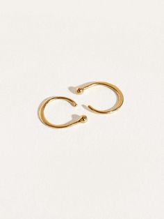 Crafted with care, these huggie hoop earrings are a staple in any minimalist jewelry collection. Their small, dainty hoops add a timeless elegance to your look, making them the perfect everyday accessory. Whether you're dressing up or keeping it casual, these delicate earrings offer the ideal blend of style and comfort. Lightweight and versatile, they're designed to enhance your wardrobe effortlessly. Discover the sophistication of these small hoops and let them become your go-to piece for every