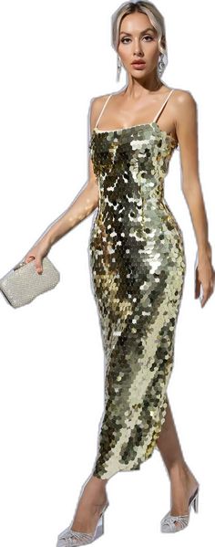 a woman in a gold sequin dress holding a purse and posing for the camera