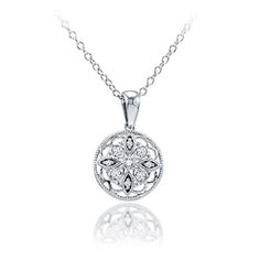 You'll adore wearing this round Sterling Silver and diamond pendant daily. The delicate filigree work describes a starburst motif, with nine sparkling diamonds adorning the points of the star. The G-H color, I2 clarity diamonds total 0.05cttw. An 18 cable chain is included. Luxury Sterling Silver Necklace With Round Diamond, Exquisite Silver Round Cut Diamond Necklace, Intricate Round Diamond Necklace, Fine Jewelry Diamond Necklace With Intricate Design, Round Diamond Necklace With Intricate Design, Diamond White Necklace With Intricate Design, Round Rose Cut Diamond Necklace, Gift Diamond Necklace With Intricate Design, Classic Diamond Necklace With Filigree