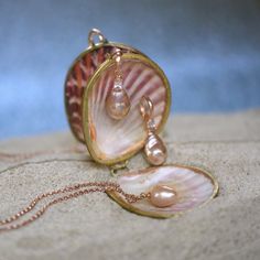 "By ancient lore, pearls were thought to be the tears of gods and goddesses. They were historically symbols of faith and purity, enhancing personal integrity. Pearls help clear the mind so it may be a better channel for wisdom and spiritual guidance. This sweet pink luster pearl is set with the warmth and rosy hue of 14k rose gold to match perfectly. Suspended on a 16\" rose gold filled cable chain. Pearl is June's Birthstone and would make an excellent gift for most any occasion: bridal gift, a Heirloom Akoya Pearl Jewelry For Gifts, Rose Gold Teardrop Jewelry With Pearl Charm, Heirloom Jewelry With High Luster For Gifts, Heirloom Style High Luster Jewelry For Gifts, Rose Gold Akoya Pearl Pendant Jewelry, Rose Gold Akoya Pearl Jewelry With Pearl Charm, Rose Gold Jewelry With Teardrop Pearl Pendant, Rose Gold High Luster Jewelry For Gift, Rose Gold Mother Of Pearl Wedding Jewelry