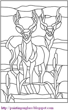 a stained glass window with two deers in the background