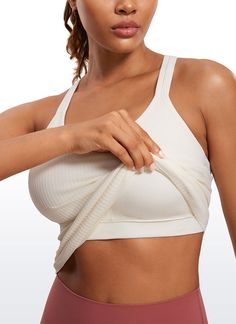 Seamless collection of smooth, breathable fabric is designed to help reduce chafing, encourage ventilation and wick away sweat to help you stay dry. Y-back and scoop neck gives you a stylish look. Built in shelf bra with removable pads provides extra support. Feature & Fitting: 
 Seamless collection 
 Design for yoga 
 Y-back 
 Built in bra & removable pads 
 Fabric: 
 Chafe-free, seamless construction 
 Sweat-wicking, soft ribbed textured fabric 
 Lightweight and stretchy 
 Body: 100% P Functional Stretch Tank Top With Seamless Design, Supportive Breathable Tops For Light Exercise, Seamless Sports Bra For Relaxation, Versatile Solid Color Sports Bra With Scoop Neck, Seamless Stretch Activewear For Relaxation, Versatile Scoop Neck Sports Bra, Breathable Stretch Activewear For Relaxation, Stretch Activewear With Light Support For Relaxation, Seamless Stretch Sports Bra With Wide Straps