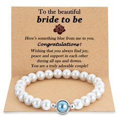 the bride to be bracelet with pearls on it is shown in front of a card