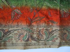 This is a beautiful Vintage Hand Embroidered Silk Saree. The colors are Green, Orange, Beige. Botanical, Floral Pattern Sari. Boho, Bohemian Party Wear, Wedding Sari. The Saree is 6 Meters Long. I have training in sewing and to me it looks like this whole 6 meters long fabric has been hand embroidered. That is very amazing. I can not start understanding how many hours it took to make. This item can be used as traditional a Sari or for home decor and sewing and craft projects. In my opinion it wo Bohemian Wedding Blouse Piece With Resham Embroidery, Bohemian Wedding Blouse With Resham Embroidery, Green Silk Blouse Piece With Embroidered Border, Green Bohemian Dupatta With Floral Embroidery, Bohemian Green Dupatta With Floral Embroidery, Bohemian Saree Blouse Piece For Wedding, Bohemian Blouse Piece For Saree Wedding, Bohemian Blouse Piece For Wedding And Festivals, Semi-stitched Orange Bohemian Dupatta