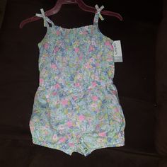 New With Tag Size 18 Months Carter's Floral Bodysuit. Casual Pink Onesie For The Beach, Blue Bubble Romper For Summer, Multicolor Jumpsuits And Rompers For Spring Playtime, Blue Summer Bubble Romper For Playtime, Blue Fitted Bubble Romper For Spring, Casual Blue Bubble Romper For Spring, Fitted Blue Bubble Romper For Spring, Spring Fitted Blue Bubble Romper, Spring Blue Onesie For Playwear