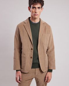 Men's slightly fitted slack jacket with a chest pocket, front patch pockets, and a 3-button closure. Notch Lapel Corduroy Outerwear With Pockets, Corduroy Notch Lapel Outerwear With Pockets, Corduroy Outerwear With Notch Lapel And Pockets, Tailored Single-breasted Corduroy Outerwear, Corduroy Sport Coat With Notch Lapel For Workwear, Casual Corduroy Blazer For Business, Fitted Slacks, Corduroy Jacket, Style Chic