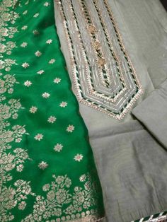 Item Overview ATHARVA Hand Embroidery Salwar Kameez w/Embroidered Neck Grey/Banarsi Silk Dupatta Green/Tunic Pants/Patiala Salwar/Churridar/Custom Stitch/ Dno. CH1455 Fabric: * Shirt Chanderi 2.5 Mts, Grey - Embroidered Neck * Dupatta: Banarsi Silk Dupatta 2.5 Mts. (Motifs May Wary) * Bottom Santoon Silk 2.5 Mts. Excusive Hand Embroidered Party Wear Punjabi Suit. Customization: * Fabrics Customization: Designs Can be made in different Fabrics. *Color Customization: Designs can be made in any col Designer Pista Green Kurta For Navratri, Festival Pista Green Cotton Silk Anarkali Set, Festive Dola Silk Kurta With Chikankari Embroidery, Pista Green Raw Silk Kurta For Transitional Season, Pista Green Chanderi Churidar With Traditional Drape, Transitional Pista Green Raw Silk Kurta, Designer Chanderi Churidar For Transitional Seasons, Pista Green Raw Silk Churidar With Traditional Drape, Pista Green Anarkali Kurta For Festive Occasions