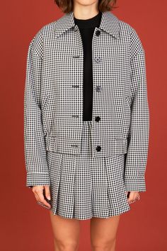 Upgrade your jacket game with our Gingham Check Jacket. This collared jacket features a trendy gingham check pattern that adds a touch of modernity to your outfit. The long sleeves with buttoned cuffs provide a tailored and polished look perfect for both casual and formal occasions. The diagonal welt pockets at the front add a functional yet stylish element to the jacket. Made with high-quality materials this jacket is designed to keep you warm and looking sharp. Don't miss out on this must-have Spring Plaid Tweed Jacket With Long Sleeves, Plaid Outerwear With Buttons For Work, Plaid Outerwear With Button Cuffs For Work, Long Sleeve Tweed Jacket With Button Cuffs For Work, Plaid Button-up Outerwear For Work, Plaid Button-up Outerwear For Office, Plaid Button-up Office Outerwear, Trendy Houndstooth Pattern Button-up Outerwear, Trendy Button-up Houndstooth Outerwear