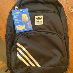 Brand New With Tags Adidas National Backpack 2.0 With White Stripes Casual Adidas Standard Backpack, Adidas Rectangular Backpack For Everyday Use, Adidas Casual Everyday Backpack, Casual Adidas Backpack For Everyday Use, Adidas Rectangular Backpack For Daily Use, Adidas Backpack With Adjustable Strap, Adidas Backpack For Everyday And Back To School, Adidas Everyday Bags For Back To School, Adidas Back To School Rectangular Bag