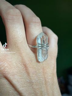 1. #ClearQuartzRing
2. #GemstoneRing
3. #WireWrapped
4. #NaturalGemstone
5. #CrystalJewelry
6. #BohoStyle
7. #HandmadeJewelry
8. #HealingCrystals
9. #CrystalHealing
10. #SpiritualJewelry
11. #QuartzPoint
12. #CrystalRing
13. #UniqueJewelry
14. #ClearQuartz
15. #BohemianStyle
16. #WireJewelry
17. #CrystalLove
18. #EnergyHealing
19. #ChakraJewelry
20. #NaturalBeauty
21. #JewelryAddict
22. #CrystalVibes
23. #HandcraftedJewelry
24. #GemstoneLove
25. #ClearQuartzCrystal
26. #SpiritualGrowth
27. #CrystalPower
28. #BohoChic
29. #WireWrapping
30. #NaturalStones Spiritual Quartz Crystals For Healing, Healing Quartz Crystals For Spiritual Use, Spiritual Silver Crystal Ring, Spiritual Quartz Gemstone Crystals, Adjustable Clear Crystals For Jewelry Making, Mystical Silver Crystal Healing Ring, Silver Crystal Ring For Healing, Minimalist Crystal Ring For Healing, Spiritual Hand-wrapped Rings For Healing