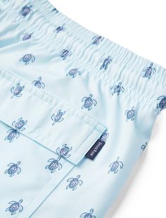 Make a splash with our Light Blue Turtle Print Swimshorts, a must-have for any beach or pool day. Crafted from a blend of 86% Polyester and 14% Elastane, these swimshorts are the epitome of comfort and durability. The fabric's 4-way stretch ensures a perfect fit that moves with you, while its quick-dry capabilities mean you won't stay wet for long after a dip. Adorned with a charming light blue turtle print, these shorts are not only functional but also stylish, designed to resist fading even un Blue Short-length Swimwear For Poolside, Blue Swimwear With Built-in Shorts For Vacation, Summer Swim Trunks For Vacation Pool, Summer Vacation Swim Trunks For Pool, Casual Blue Swim Trunks With Built-in Shorts, Beachy Short Swimwear For Pool, Light Blue Beachwear Shorts, Light Blue Beachwear Shorts For Summer, Summer Vacation Poolside Swim Trunks