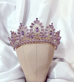 Beautiful lavender lilac purple crown with Austrian crystals and gold metal. This purple tiara Shines radiantly Perfect for weddings, pageants, quinceanera, birthdays or any special occasion. Comes beautifully packaged in a pouch. ships out within 1 day Quince Jewelry Set Purple, Crown For 15 Purple, Gold And Purple Uince Dress, Purple Star Crown, Lavender Wedding Tiara, Lavender Quinceanera Tiara, Amythyst Crown, Purple Quinceanera Jewelry, Purple Quinceanera Crowns