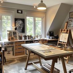 an artist's studio with lots of art supplies