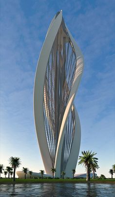 a tall white sculpture sitting on top of a lake next to palm trees and a blue sky