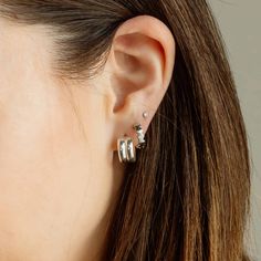 These ethically-made silver huggie hoop earrings are more than just a fashion statement; they're also a statement of quality, ensuring trendy modernity and high-impact minimalism wherever the day takes you! Details: Size: 13mm x 7mm Post Material: stainless steel, nickel free Hoop Material: stainless steel with sterling silver plating Your purchase promotes living wage jobs, innovation, and entrepreneurship. All profit from the sale of these earrings is donated to stop human trafficking. Stop Human Trafficking, Innovation And Entrepreneurship, Hoop Charms, Jewelry Care Instructions, Month Gifts, Huggie Hoop Earrings, Dainty Earrings, Personalized Necklace, Leather Earrings