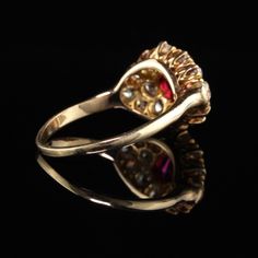 Beautiful Antique Art Deco 14K Yellow Gold Old European Diamond Ruby Ring. This amazing ring features chunky old european cut diamonds surrounding a synthetic ruby center stone. Synthetic rubies were commonly used in many antique pieces due to the affordability. This particular stone looks amazingly natural and a beautiful red color to it! Item #R0772 Metal: 14K Yellow Gold Diamond: Approximately 1.75 ct Color: H Clarity: VS2 Synthetic Ruby: Approximately 2 cts Weight: 4.9 Grams Ring Size: 8 Mea Wedding Band Engraving, Diamond Cluster Earrings, Diamond Cluster Engagement Ring, Antique Wedding Rings, Art Deco Bracelet, Cluster Engagement Ring, Bracelets Gold Diamond, European Cut Diamonds, Antique Diamond