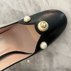 Authentic Gucci Pumps Brand New Never Worn Elegant Gucci Calf Leather Heels, Gucci Luxury Heels With Round Toe, Gucci Designer Flat Heels, Designer Gucci Flat Heels, Designer Gucci Heels With Flat Heel, Elegant Gucci Heels With Leather Sole, Gucci Luxury Almond Toe Heels, Gucci Pumps, Pearl Details