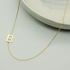 14K GOLD PERSONALIZED INITIAL NECKLACE * Material: 14k Solid Gold - 8k Solid Gold * Finish: White Gold - Yellow Gold - Rose Gold * Production Method : Laser and handmade processes * Lenght: Adjustable Between 14 inch - 20 inch * Letter Height: 1 cm A Necklace that your neck will seriously loveee. This name necklace is perfect for everyday. * 100% Handmade for your size * All jewelry comes in beautiful packaging, gift ready. * All items are made to order in Turkey. * Our current processing times Yellow Gold Initial Necklace For Birthday, Elegant Yellow Gold Initial Necklace For Birthday, Dainty Initial Necklace In Yellow Gold For Birthday, Gold Initial Pendant Necklace With Hallmark, Initials Yellow Gold Necklace For Birthday Gift, Yellow Gold Initial Pendant Necklace For Birthday, 14k Gold Initial Pendant Necklace For Birthday, Yellow Gold Initials Jewelry For Birthday Gift, Yellow Gold Initials Necklace For Birthday