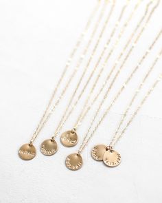 "This disc necklace is a classic, easy to gift piece. From the chain to the pendant, this style is made with 14k gold filled or sterling silver pieces, meaning it is built to last. Personalize this necklace with the names, dates, and special words that mean the most to you!  𝗘𝗮𝘀𝘆 𝗧𝗼 𝗦𝘁𝘆𝗹𝗲, 𝗠𝗮𝗱𝗲 𝗧𝗼 𝗟𝗮𝘀𝘁 Our classic 1/2\" necklaces are easy to layer, elegant, and ready to be personalized with your most special sentiments, moments, and memories! Created to last a lifetime, these necklaces will remain evergreen even as the years and trends come and go. 𝗠𝗮𝘁𝗲𝗿𝗶𝗮𝗹𝘀 𝗪𝗲 𝗨𝘀𝗲 This necklace is made entirely with sturdy 14k yellow gold filled, 14k rose gold filled, or sterling silver pieces. It is safe to wear in the shower, but we recommend avoiding prolonged exposur 3d Bracelet, Silver Statue, Necklace Everyday, Piccadilly Circus, Fancy Necklace, Special Words, Necklace Minimalist, Choker Style, Disc Necklace