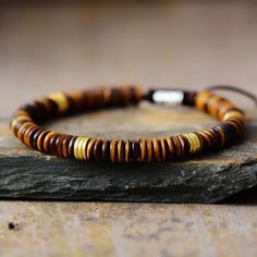 This beautiful Trends Beads Delicate Bracelet makes the perfect accessory for any man. Made with quality and attention to detail, it's sure to become a wardrobe staple. A perfect finishing touch to any outfit. Material: Tiger Eye, Imperial Jasper, Alloy. Size: women- 6.7"+ 3.9". /Men-7.3"+3.9" Technology: Handmade Bohemian Jewelry: Wear this bohemian jewel bracelet to add color to your daily life. The cool bohemian bracelet is suitable for leisure, party, graduation party, classroom, wedding, br Adjustable Brown Bracelets With Colorful Beads, Brown Bracelets With Colorful Beads And Adjustable Fit, Adjustable Polished Bead Bracelets For Beach, Adjustable Polished Beads Bracelets For Beach, Brown Bangle Bracelet With Colorful Beads, Adjustable Polished Beads Bracelet For Beach, Brown Braided Bracelets With 8mm Beads, Brown Hand-strung Friendship Bracelets With Round Beads, Brown Hand-strung Braided Bracelets With Round Beads