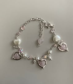 Handmade heart charm bracelet  Made with silver plated wire  Rose Quartz pink beads 9 inches long including chain Wired Bracelets With Beads Diy, Cute Chain Bracelets, Coquette Bracelets, Cute Charm Bracelets, Handmade Bead Bracelets, Cute Jewelry Ideas, Pink Charm Bracelet, Chain Bracelet Diy, Wire Rose