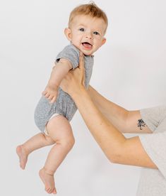 You're going to love our basic onepiece. This super soft, classic style takes on a modern twist that is perfect for layering or all by itself. Details: Color: Grey Ribbed cotton/spandex blend, allowing the perfect fit Ribbed neckline Rolled sleeve cuffs Inner leg snaps for easy diaper changes Material + Wash: 95% cotton | 5% spandex Buttery soft with the perfect amount of stretch Machine wash with like colors on cold Dry on low heat Do not bleach May experience slight shrinkage on first wash Avo Stretch Cotton Onesie For Playwear, Playful Fitted Onesie For Loungewear, Casual Stretch Onesie With Short Sleeves, Stretch Cotton Onesie For Playtime, Casual Stretch Onesie For Playwear, Unisex Playful Onesie For Loungewear, Unisex Cotton Onesie For Loungewear, Unisex Casual Short Sleeve Bodysuit For Playwear, Casual Stretch Bodysuit For Playwear