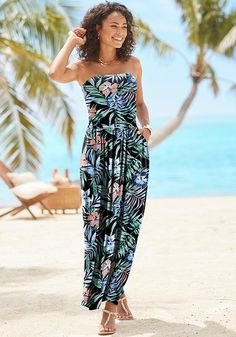 Fashionable strapless maxi dress that is perfect for warm weather. Strapless Maxi Dress For Spring Vacation, Casual Strapless Dress For Beach Cover-up, Summer Strapless Mini Dress For Vacation, Summer Vacation Strapless Dress, Strapless Summer Dress For Vacation, Strapless Maxi Dress For Vacation, Summer Maxi Strapless Dress For Day Out, Summer Maxi Length Strapless Dress For Day Out, Strapless Tropical Print Summer Dress