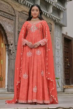 Orange long anarkali with handwork embroidery. Comes with floral butti embroidered dupatta. - Aza Fashions Floor-length Raw Silk Dupatta With Chikankari Embroidery, Designer Floor-length Salwar Kameez With Dori Work, Unstitched Raw Silk Anarkali Set With Zari Work, Unstitched Floor-length Salwar Kameez With Dori Work, Dola Silk Dupatta With Chandbali Dabka Work, Wedding Anarkali Set With Dupatta In Chanderi, Elegant Mulmul Anarkali Set For Festivals, Wedding Anarkali Traditional Wear With Dabka Work, Unstitched Slub Silk Churidar With Cutdana