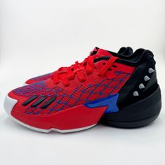 Adidas Marvel X D.O.N. Issue # 4 Basketball Sneakers Shoes Brand New With Tags (No Box) Big Kids Us Size 4 Vivid Red / Blue / Core Black Donovan Mitchell Signature Shoe Marvel Spider-Man Graphics Lace Closure Lightlock Upper Lightstrike Cushioning Rubber Outsole 25% Of The Components Used To Make The Upper Are Made With A Minimum Of 50% Recycled Content The Future Of Basketball Is All About Speed, And Donovan Mitchell Is As Fast As They Come. These Juniors' Signature Shoes From Mitchell And Adid Multicolor Sneakers With Red Sole For Sports, Light Sports Basketball Shoes With Red Sole, Adidas Casual Basketball Shoes With Rubber Sole, Sporty Red Basketball Shoes With Laces, Dynamic Sneakers With Red Sole And Round Toe, Dynamic Basketball Shoes With White Sole And Round Toe, Dynamic Basketball Shoes With Round Toe And White Sole, Dynamic Basketball Shoes With Red Sole, Red Dynamic Running Shoes With Laces