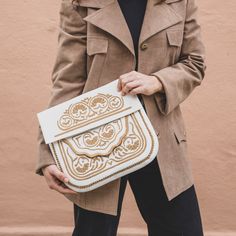 Cream Embroidered Leather Satchel from Morcco Embroidered Cream Rectangular Clutch, Cream Embroidered Rectangular Clutch, Traditional Embroidered Clutch For Daily Use, White Embroidered Satchel Shoulder Bag, Embroidered Clutch Bag For Travel, Traditional White Travel Bag, Traditional Embroidered Beige Clutch, Embroidered Cream Clutch Bag, Traditional Beige Embroidered Clutch