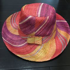 Nwot Colorful Straw Sun Hat W/Adjustable Band Brand New, Never Worn! Purchased At An Art And Farmer’s Market In Florida, Put In Suitcase Home And Never Wore It. This Hat Does Fold For Easy Transport Has Adjustable Ties Inside Very Colorful Straw Hat! Orange, Purple, Red, Yellow, Blue Adorable Faux Bow On Back. Ships Same Or Next Day From A Smoke And Pet Free Home. Multicolor Adjustable Casual Fedora, Adjustable Multicolor Casual Fedora, Multicolor Adjustable Sun Hat With Flat Brim, Adjustable Multicolor Sun Hat With Flat Brim, Multicolor Casual Fedora For Spring, Casual Purple Sun Hat For Summer, Casual Multicolor Fedora For Spring, Adjustable Multicolor Panama Hat For Spring, Multicolor Summer Fedora For Vacation