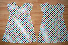 two pieces of paper that have been made to look like polka dots on the fabric