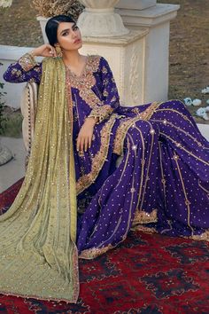 Buy Raw Silk Sharara Kameez Purple Bridal Dress Pakistani, a traditional masterpiece gracefully embellished with Mirror work, Zardosi, and Lavish designs. Purple Mehndi Outfit, Purple Bridal Dress, Purple Pakistani Dress, Green Pakistani Dress, Bridal Dress Pakistani, Eid Fits, Mehndi Event, Bridal Sharara, Sharara Dress