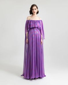 Step into the spotlight with our off-shoulder flared-cut purple evening dress, adorned with captivating ruffled details. Embrace elegance and grace in this striking ensemble. Purple Evening Dress, Unique Prom Dresses, Cut Dress, Chiffon Dress Long, Pleated Bodice, Cape Dress, Dress Cuts, Chiffon Dress, Evening Dress