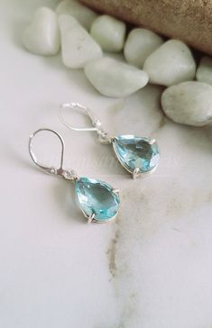 Aquamarine Earring    Aquamarine dangle, Long Tear drop Earring, Ocean blue gemstone drop earrings, gift for her, gift for mom, March birthstone,925 Sterling Silver Pear Earring  teardrop  created Gemstone earrings gemstone-10x14mm gemstone-lab grown <> Some basic benefits of wearing Aquamarine Gemstone: Attracts money. Brings good fortune. Financial abundance. Protects from negative energies. Cleanses all evil thoughts. Stability in married life. Improves communication. Boosts self-confidence. FREE SHIPPING AND USPS TRACKED PARCELS WORLDWIDE. Our products are totally handmade and made with high quality gemstones and 925 solid sterling silver If you believe in buying top quality products for yourself and for your family and friends, SE is the place where you want to be There are unique pie Pear Earrings, Gemstone Drop Earrings, Aquamarine Earrings, March Birthstone, Silver Gifts, Drop Earring, Blue Gemstones, March Birth Stone, Ocean Blue