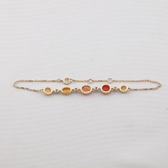 Beautiful Mexican Fire Opal Diamond Bracelet in 18K Yellow Gold. Free Domestic USPS First Class Shipping! Free One Year Limited Warranty! Free Gift Bag or Box with every order! Opal—the queen of gemstones, is one of the most beautiful and rarest gemstones on earth. Every piece of opals has its colors and patterns, which is perfect for designers to create unique engagement rings for someone extra special. We use 100% Natural & Ethically opal stones (NO synthetics or imitations) for our jewelry. - Gold Multi-stone Diamond Bracelet As Gift, Yellow Gold Multi-stone Bracelet Gift, 14k Yellow Gold Bracelet With Gemstone, Yellow Gold Multi-stone Diamond Bracelet Gift, Gift Yellow Gold Multi-stone Diamond Bracelet, Yellow Gold-plated Gemstone Bracelet, Multi-stone 14k Yellow Gold Bracelets, 14k Yellow Gold Multi-stone Bracelets, 14k Yellow Gold Multi-stone Bracelet