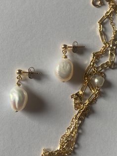 Timeless and elegant earrings that work with everything and are simple, yet stylish. They are lightweight and easy to stack with other earrings or wear by themselves. They are made with cultured pearls and gold filled materials. They are safe to wear in water, but should stay away from chemicals like soaps, lotions, and perfumes. Diana Earrings, Lotions And Perfumes, Shoe Charms, Elegant Earrings, Cultured Pearls, In Water, Shop Necklaces, Chemicals, Necklaces Bracelets