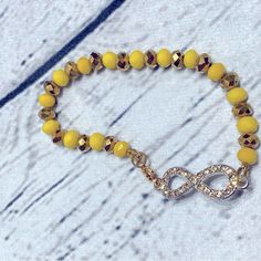 Oshun Orisha Osun Ochun Bracelet Ilde I Made With Crystals Checo, The Infinity Sign, It’s Silver And Gold. Es La Diosa Del Amor, Pray To The Fertility And Love. Yellow Round Beads Bracelet For Everyday, Yellow Beaded Bracelets For Everyday, Yellow Round Bead Bracelets For Everyday, Adjustable Yellow Bracelets As Gift, Adjustable Yellow Bracelets For Gifts, Yellow Beaded Bracelets For Friendship, Yellow Bracelets With Gold Beads Gift, Yellow Beaded Bracelets With Round Beads For Everyday, Handmade Yellow Spiritual Bracelets