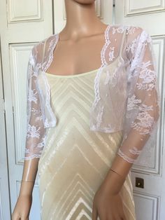 This is a beautiful hand made white lace jacket ideal for weddings or special occasions. The jacket has 3/4 length sleeves. It can also be worn with casual wear. It can be made in any size from 8 to 24 (UK sizes). It is made in the UK. It is normally sent out to you within 5 days, but I am very happy to make your order a priority if you need it urgently. Just let me know the date needed by. Postage is free in the UK! International postage is £9. I am happy to exchange items or refund your paymen White Lace Jacket, Shrug Jacket, Bolero Shrug, Lace Jacket, Beautiful Hand, Three Quarter, White Lace, Bridal Gowns, Lace Top